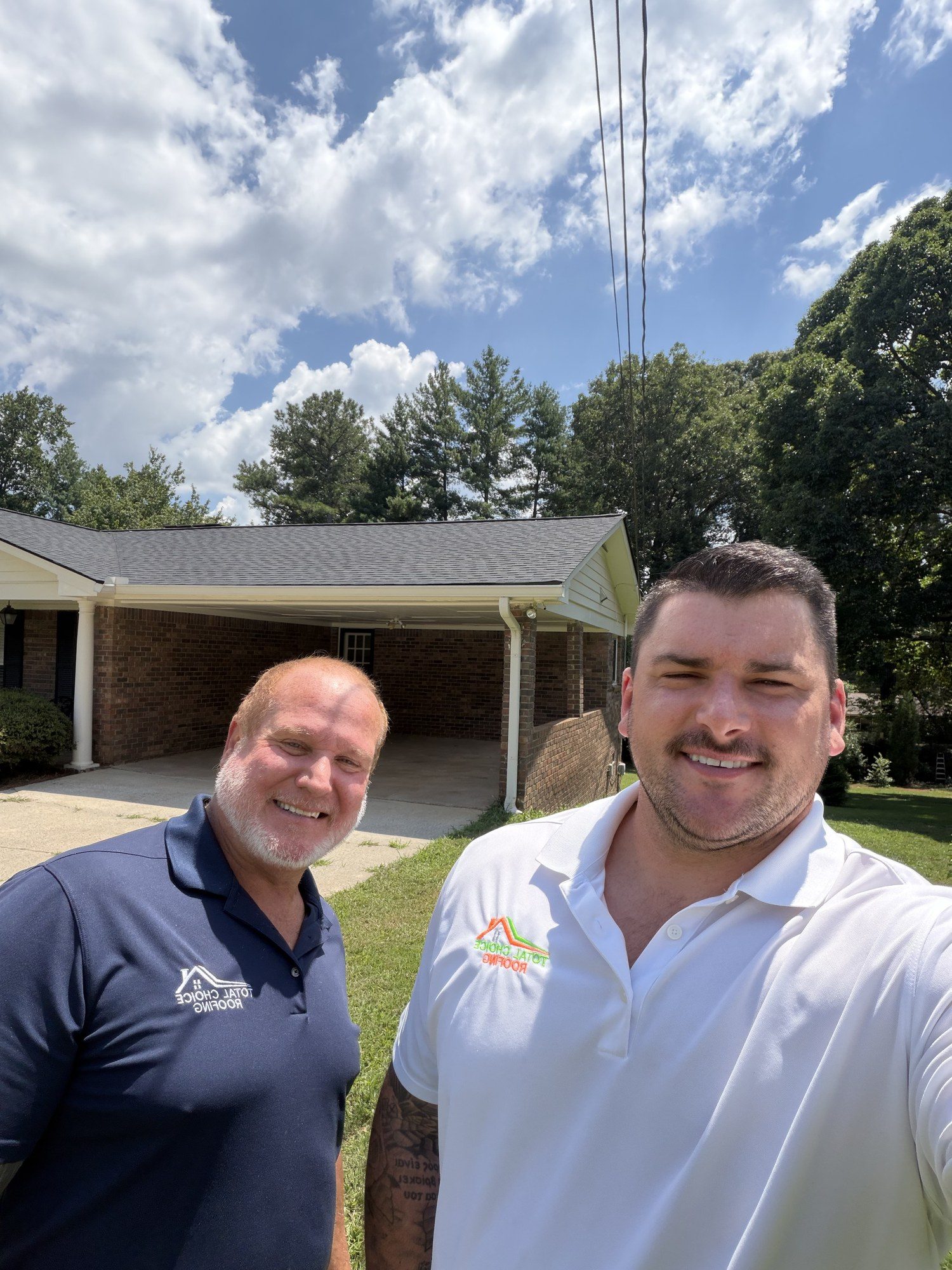 Rick Roth and the Total Choice Roofing team on a job in Suwanee, GA